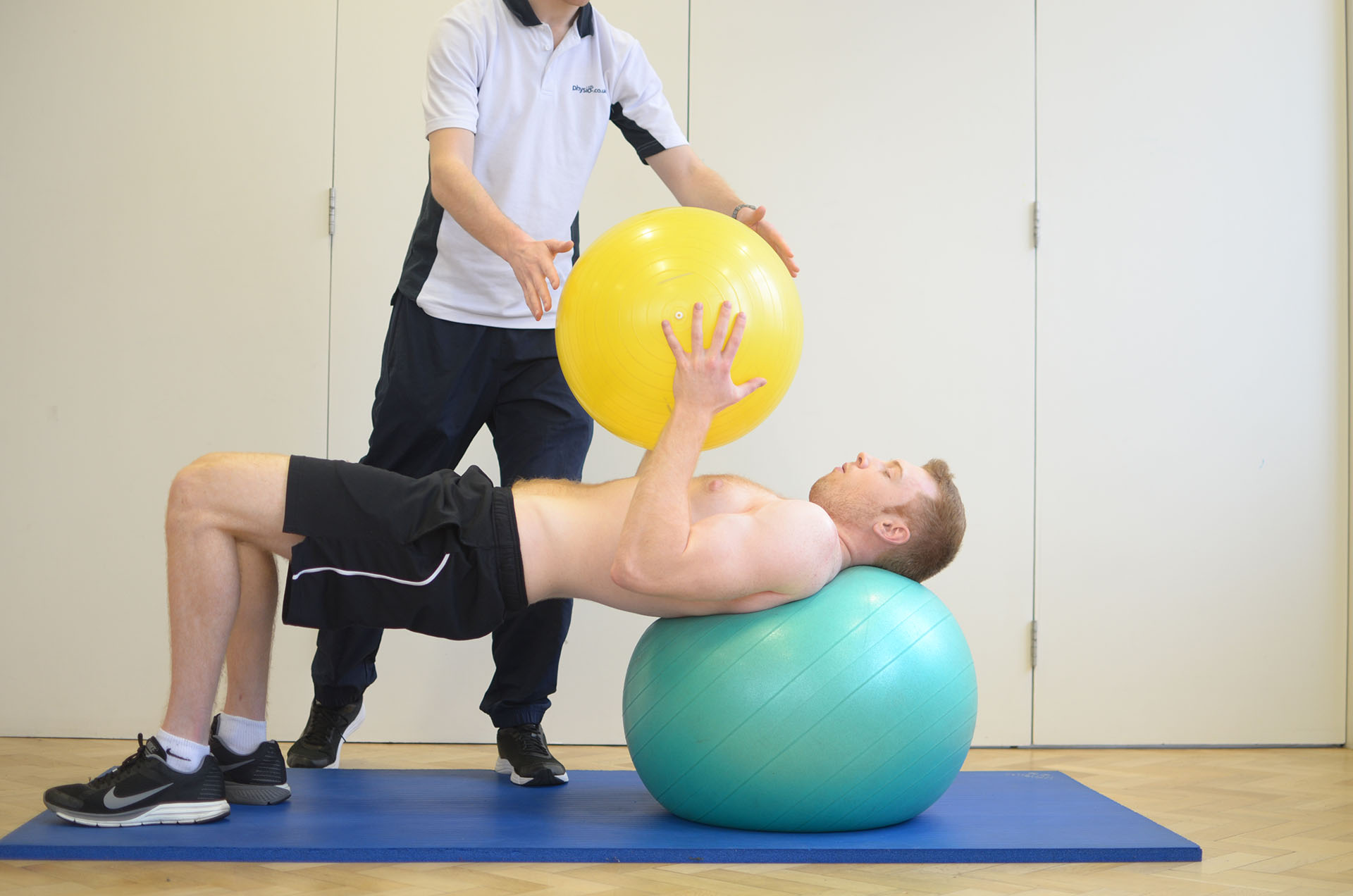 Exercise ball therapy at Manchester Physio clinic